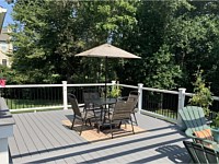 <b>Trex Select Pebble Gray Composite Deck with Trex Composite Railing with black aluminum balusters</b>
